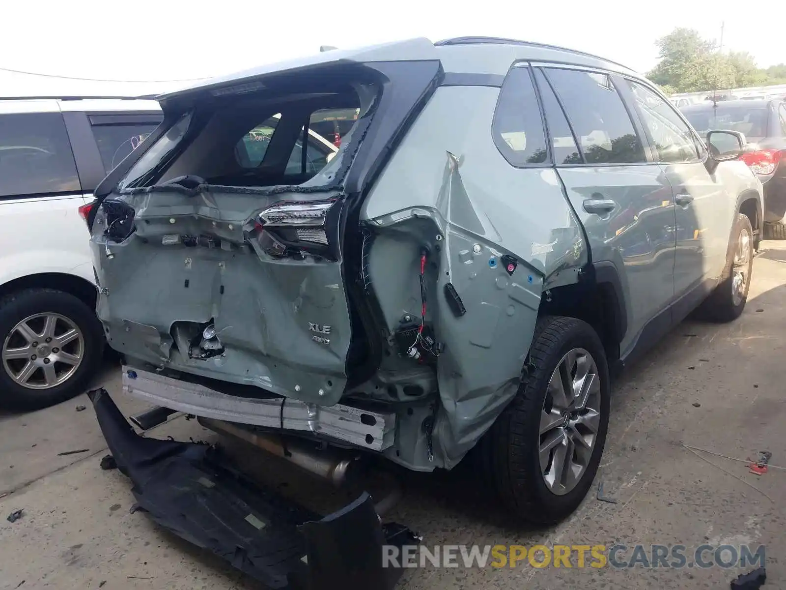 4 Photograph of a damaged car JTMA1RFV9KD513607 TOYOTA RAV4 2019