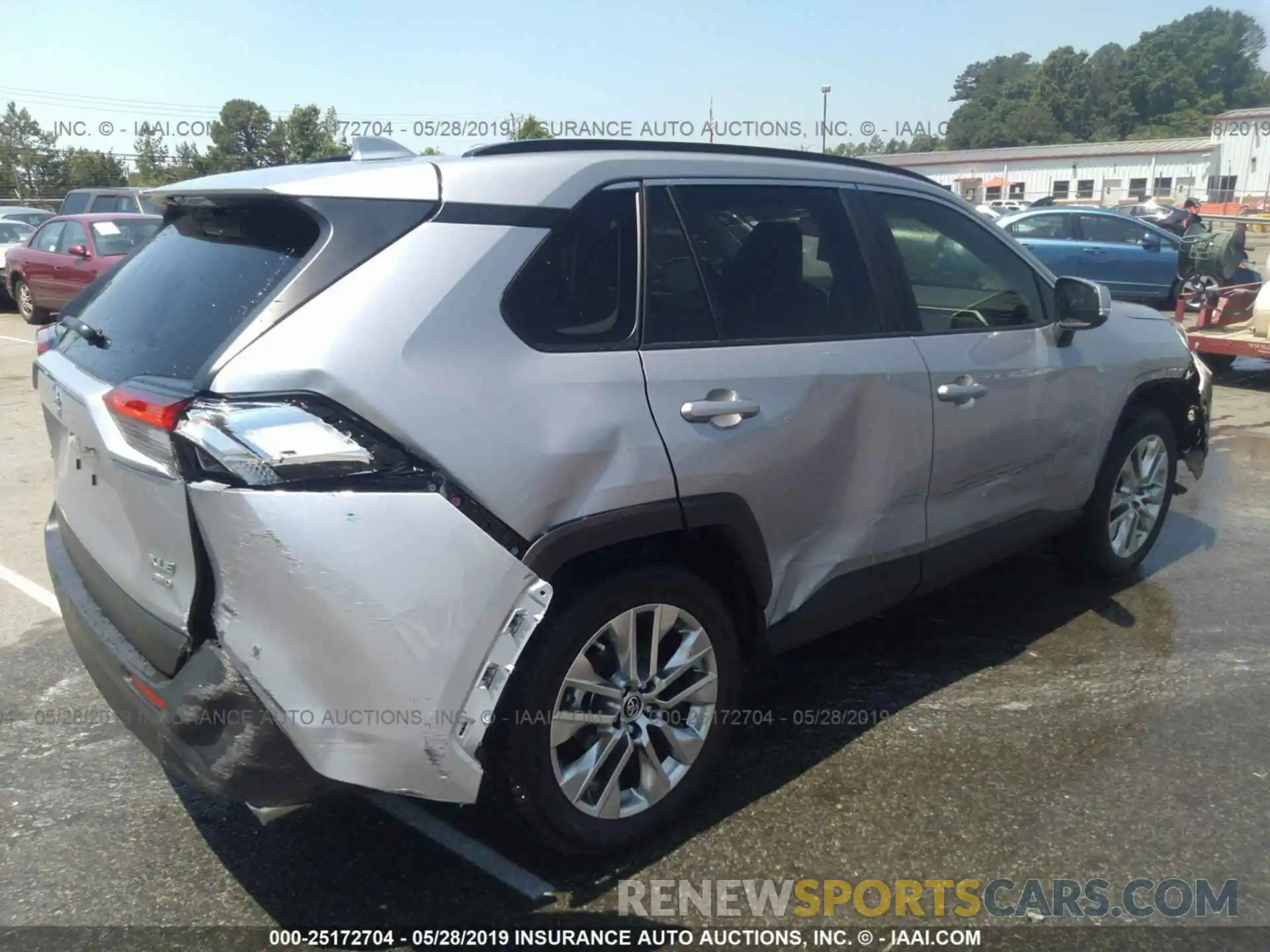 4 Photograph of a damaged car JTMA1RFVXKD011317 TOYOTA RAV4 2019