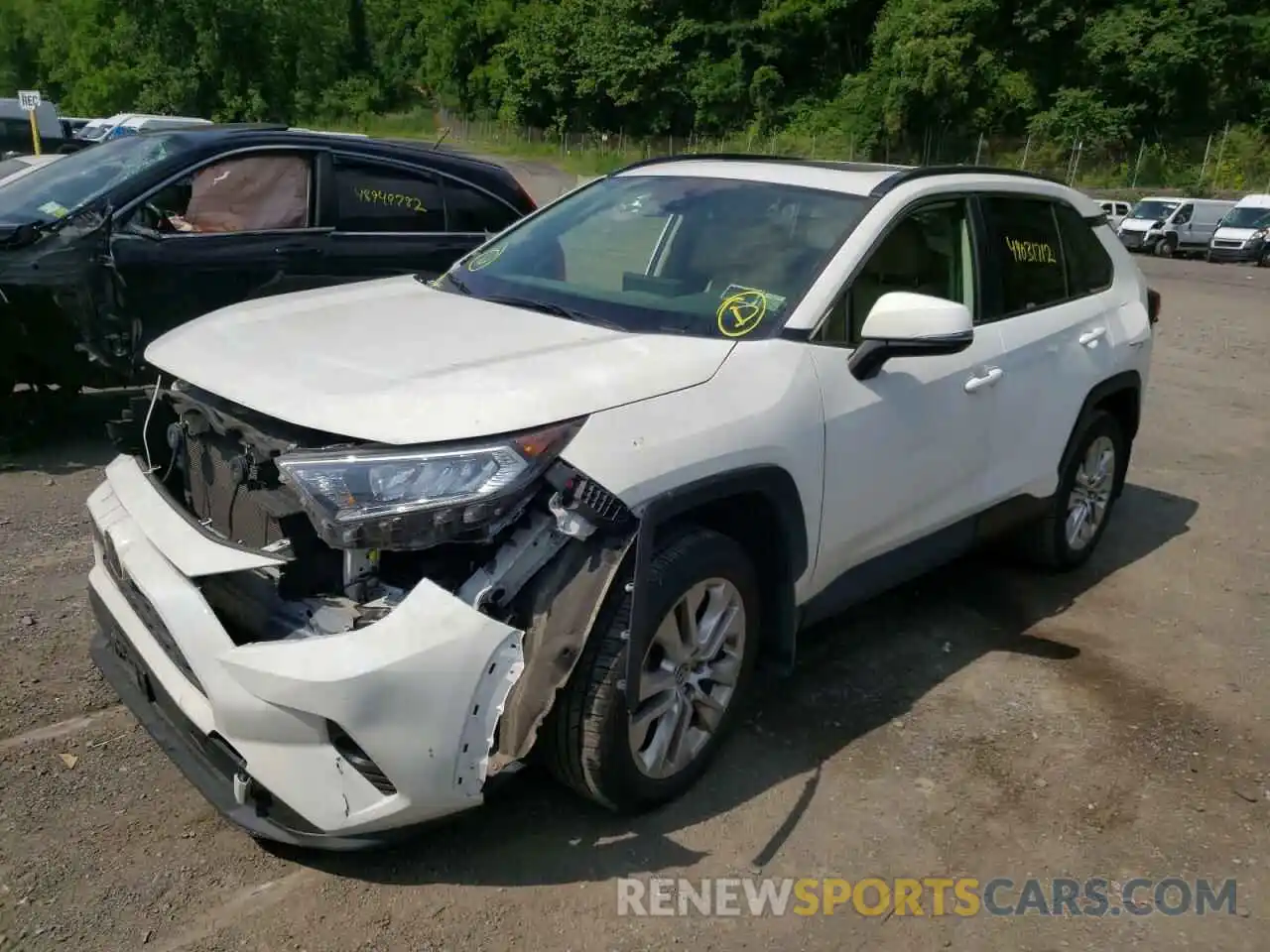 2 Photograph of a damaged car JTMA1RFVXKD031762 TOYOTA RAV4 2019