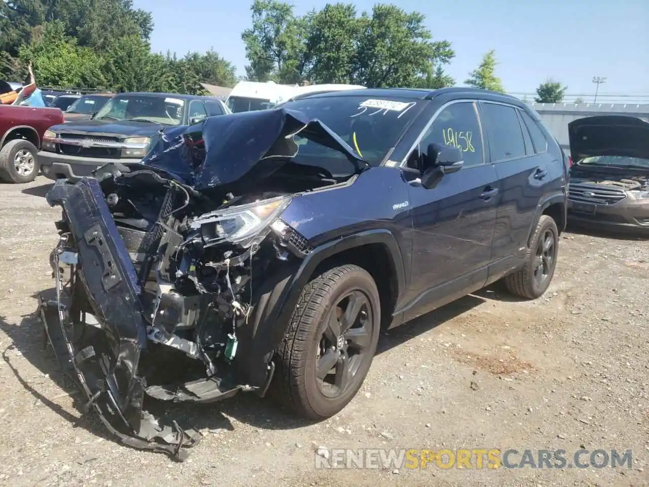 2 Photograph of a damaged car JTMEWRFV1KD503317 TOYOTA RAV4 2019