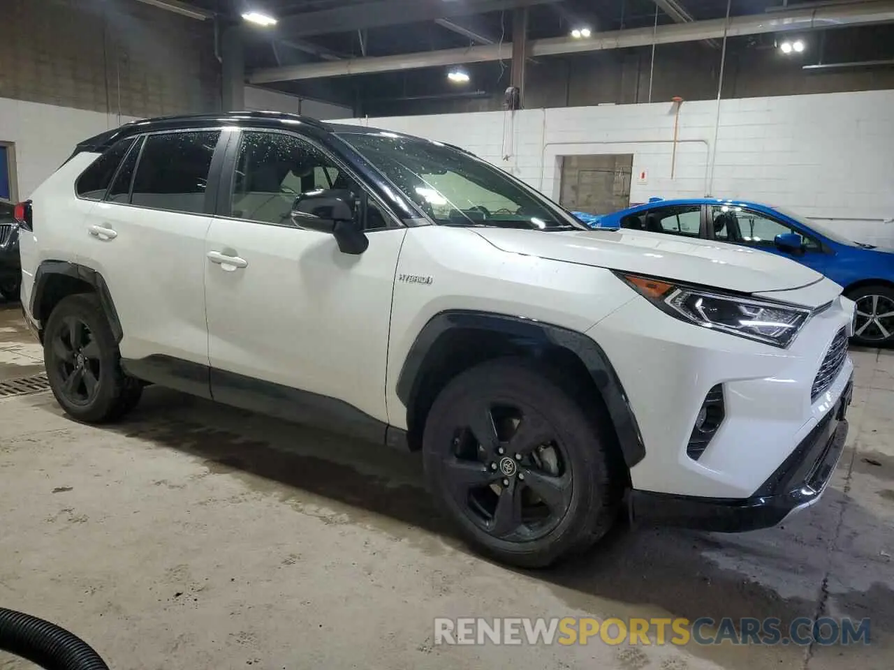 4 Photograph of a damaged car JTMEWRFVXKD510024 TOYOTA RAV4 2019