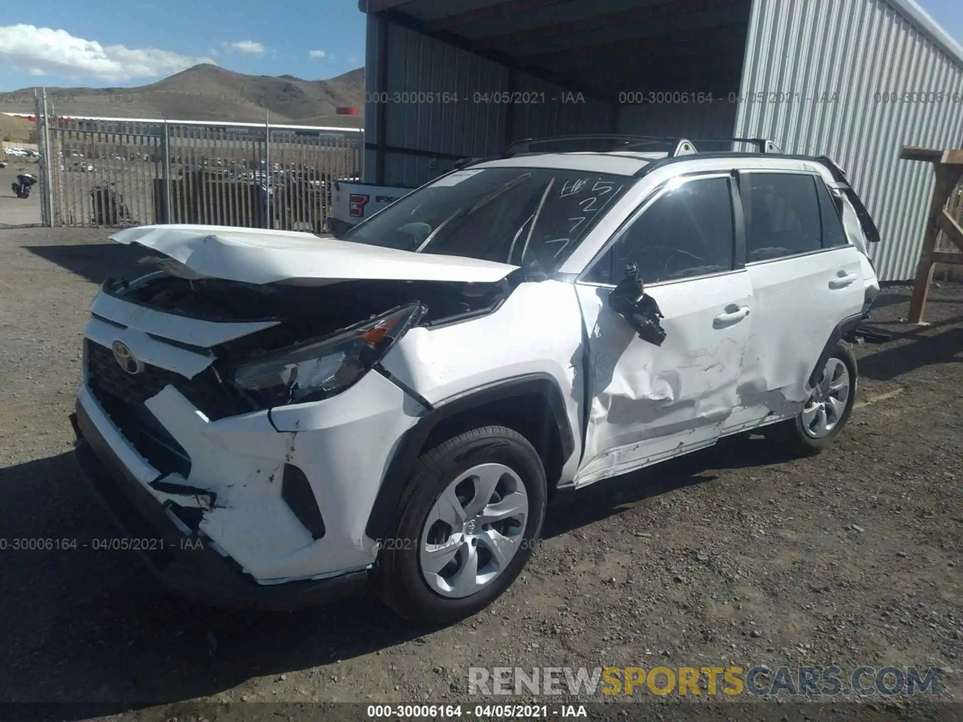 2 Photograph of a damaged car JTMF1RFV3KD015277 TOYOTA RAV4 2019