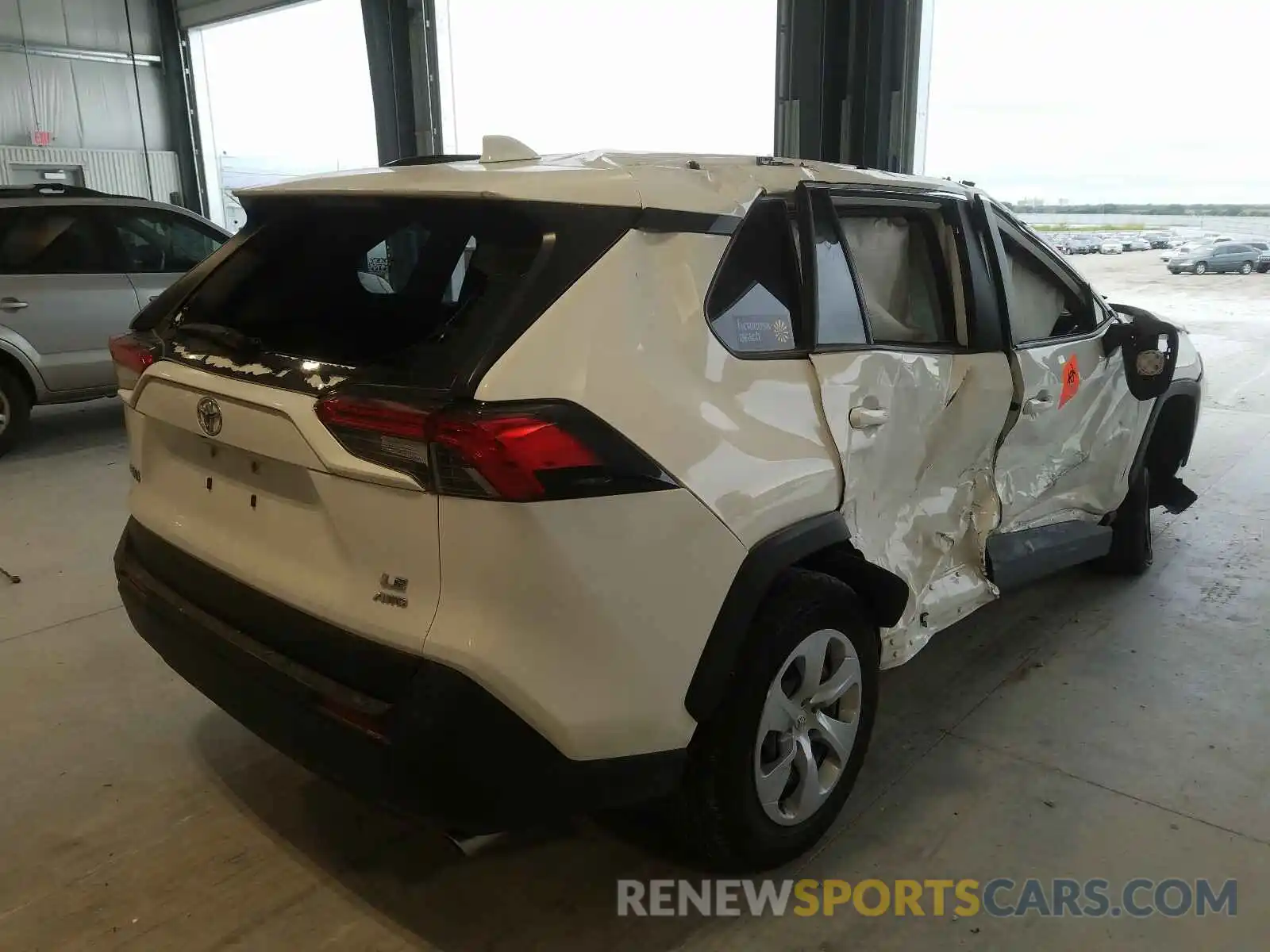 4 Photograph of a damaged car JTMG1RFV4KJ012488 TOYOTA RAV4 2019