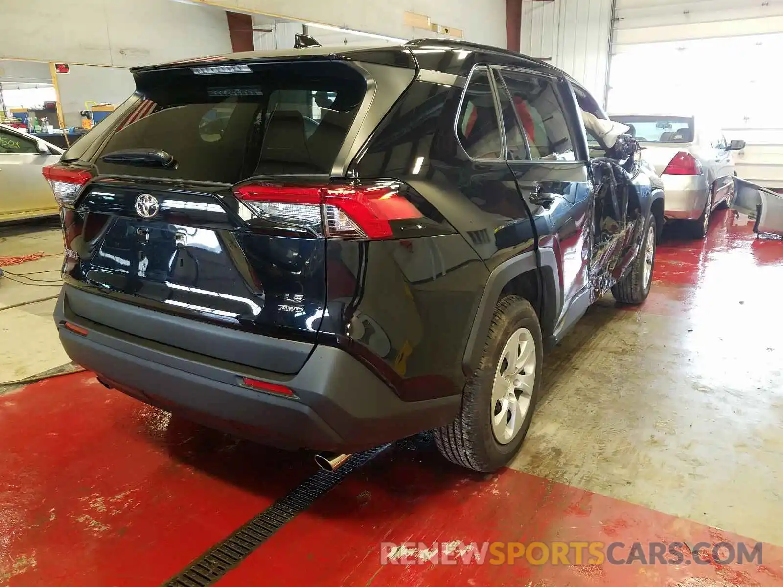 4 Photograph of a damaged car JTMG1RFV6KJ013688 TOYOTA RAV4 2019