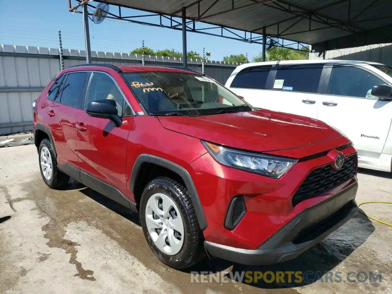 1 Photograph of a damaged car JTMH1RFV5KJ001858 TOYOTA RAV4 2019