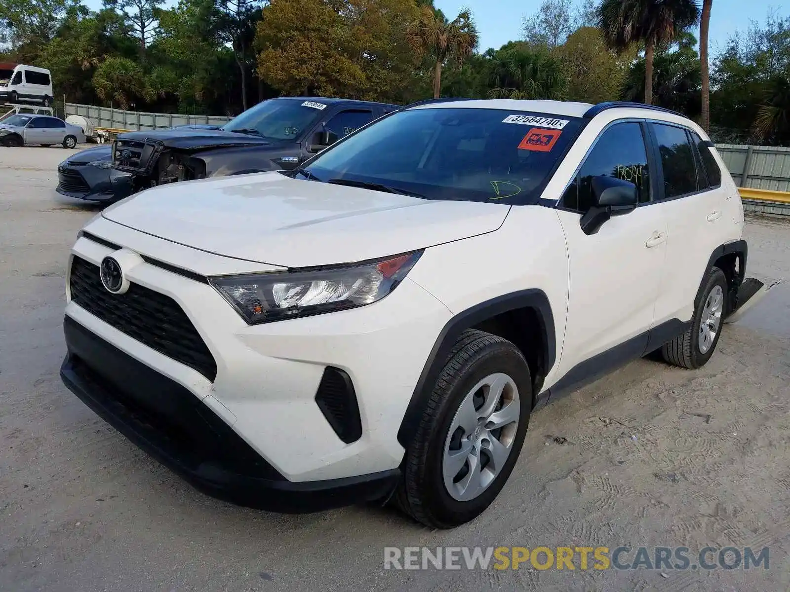 2 Photograph of a damaged car JTMH1RFVXKJ006411 TOYOTA RAV4 2019