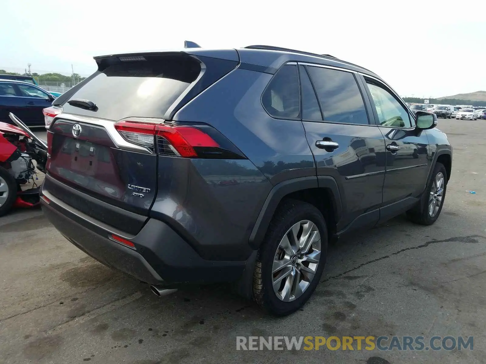 4 Photograph of a damaged car JTMN1RFV3KD517895 TOYOTA RAV4 2019