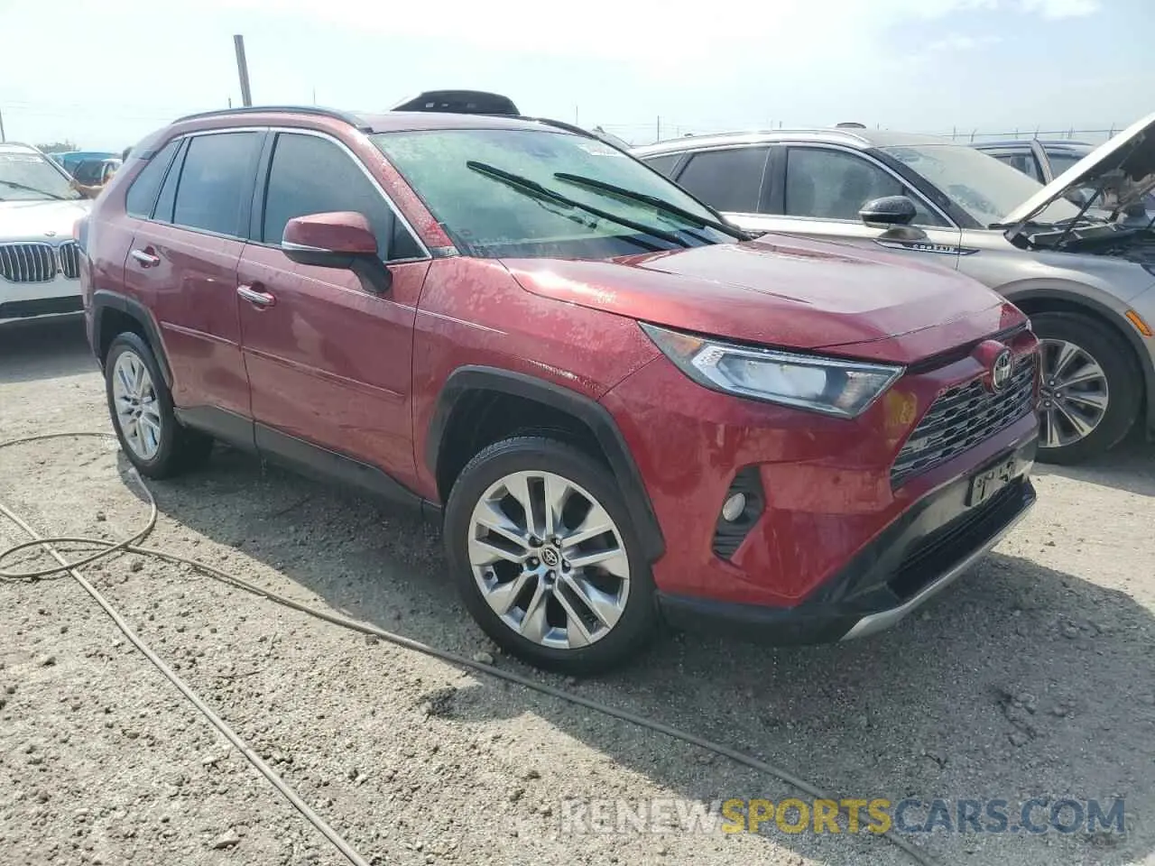 4 Photograph of a damaged car JTMN1RFV8KD025704 TOYOTA RAV4 2019