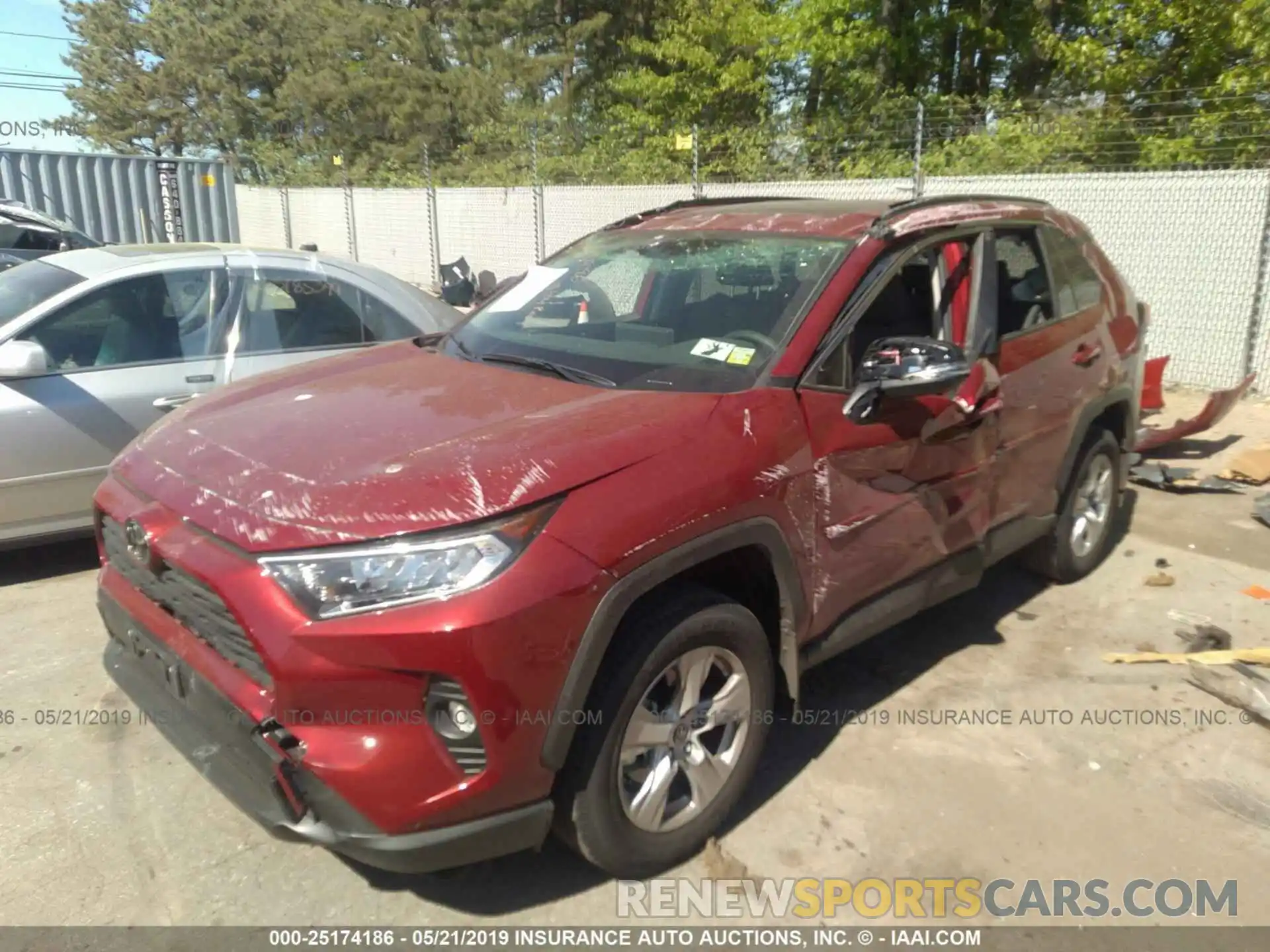 2 Photograph of a damaged car JTMP1RFV0KD003334 TOYOTA RAV4 2019