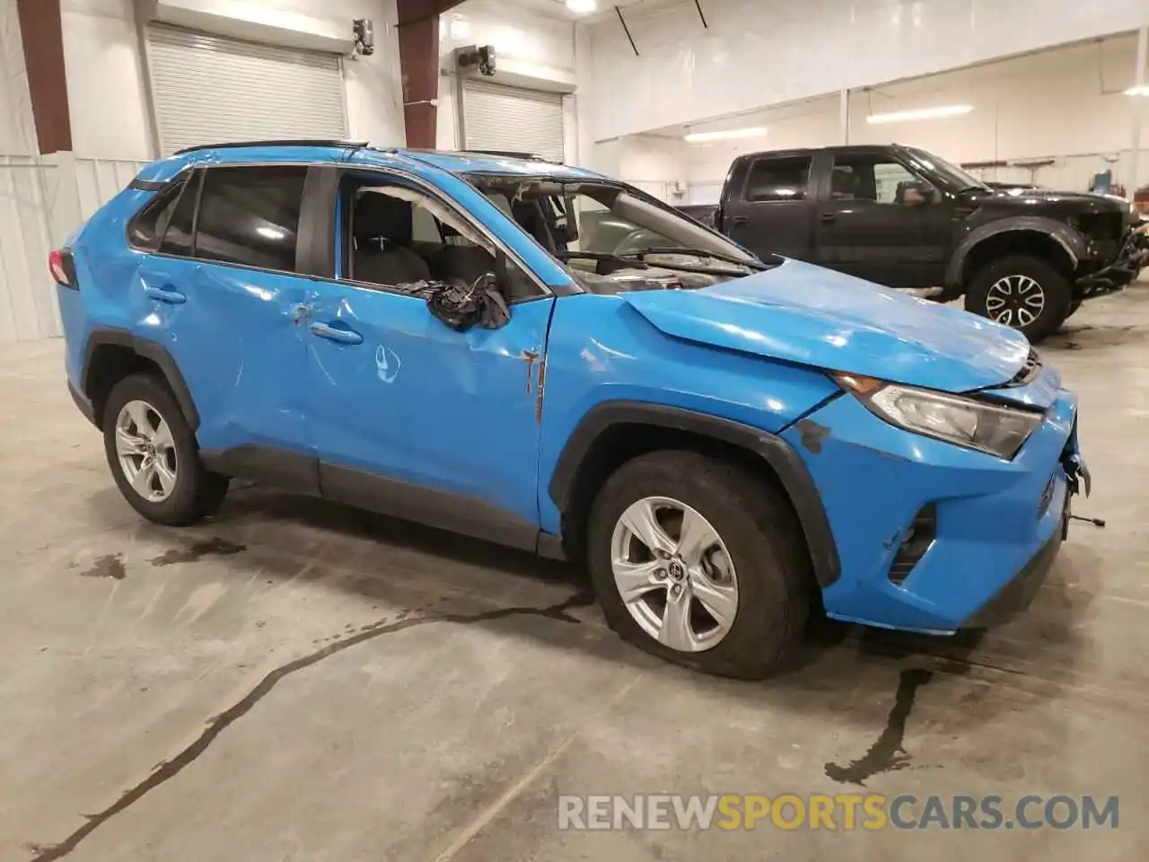 4 Photograph of a damaged car JTMP1RFV0KD027567 TOYOTA RAV4 2019