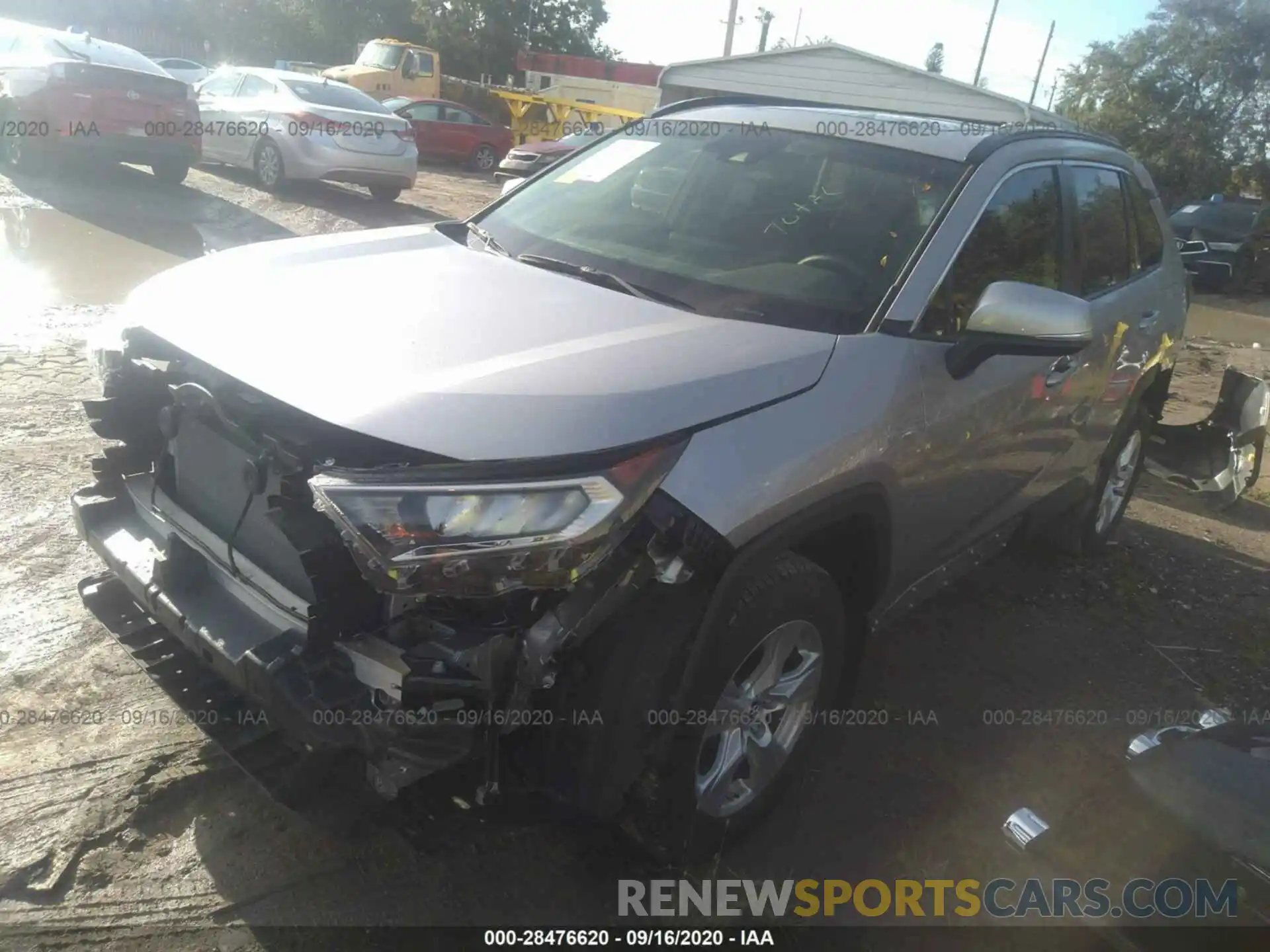 2 Photograph of a damaged car JTMP1RFV0KD033014 TOYOTA RAV4 2019