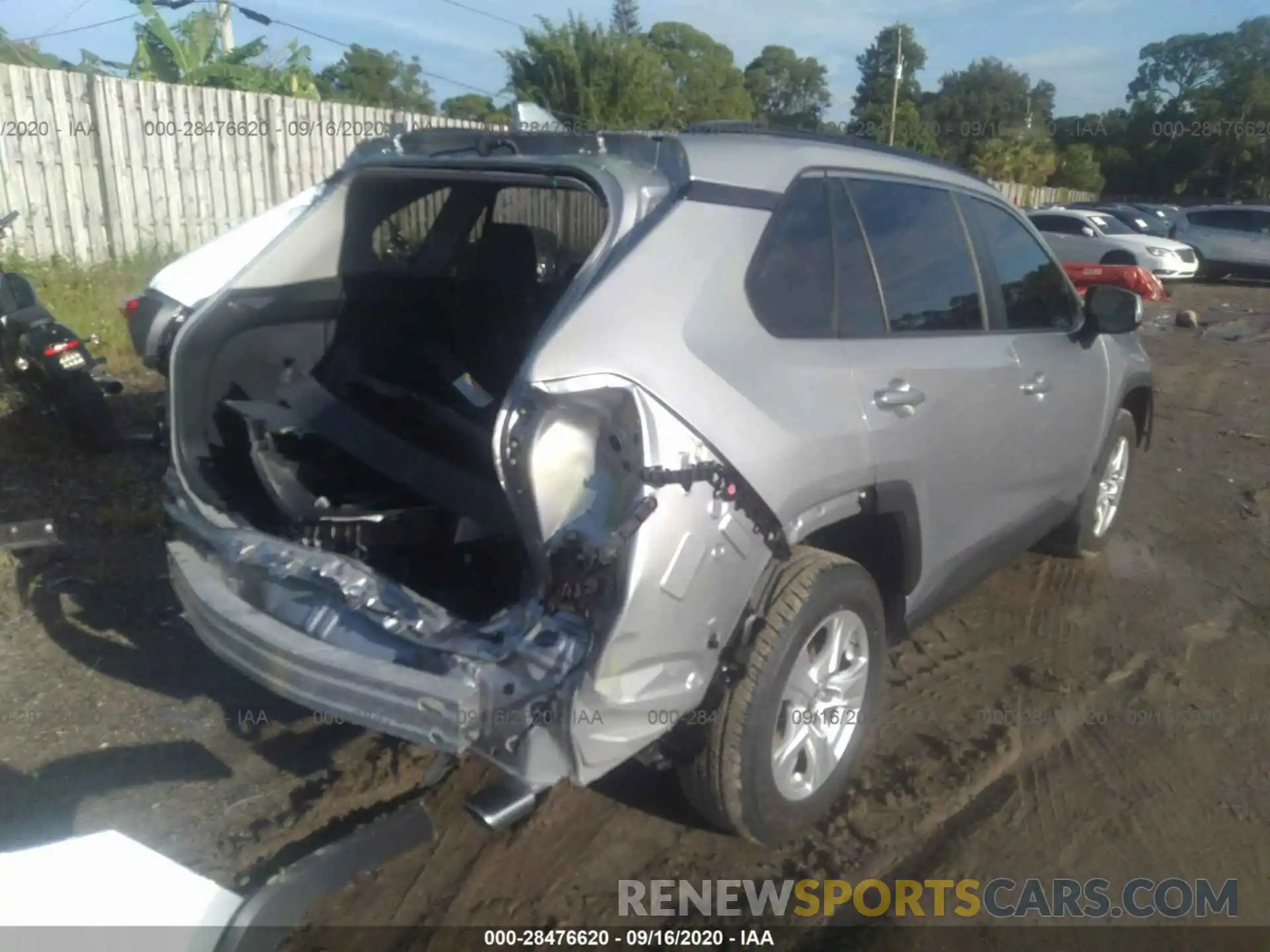 4 Photograph of a damaged car JTMP1RFV0KD033014 TOYOTA RAV4 2019