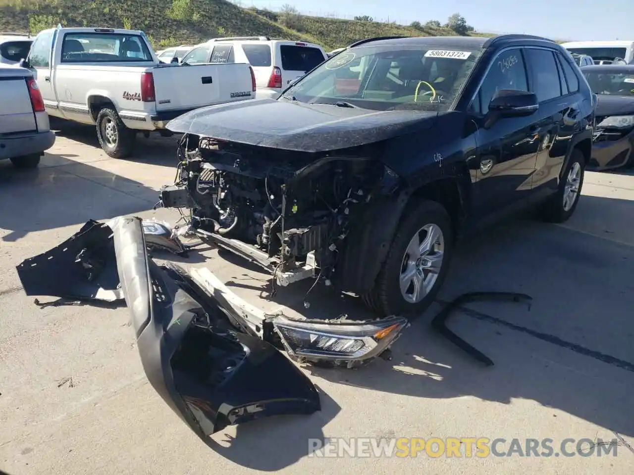 2 Photograph of a damaged car JTMP1RFV0KD038746 TOYOTA RAV4 2019