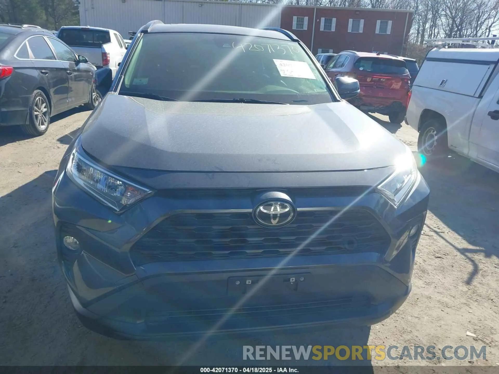 12 Photograph of a damaged car JTMP1RFV0KD524246 TOYOTA RAV4 2019