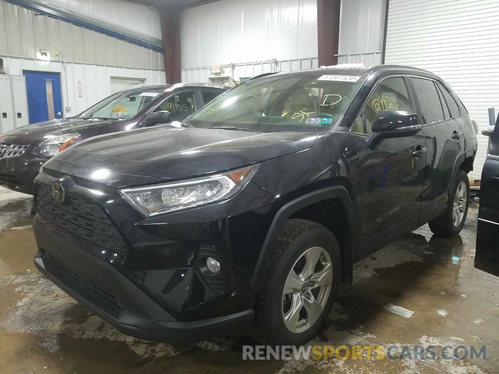 2 Photograph of a damaged car JTMP1RFV0KJ010091 TOYOTA RAV4 2019
