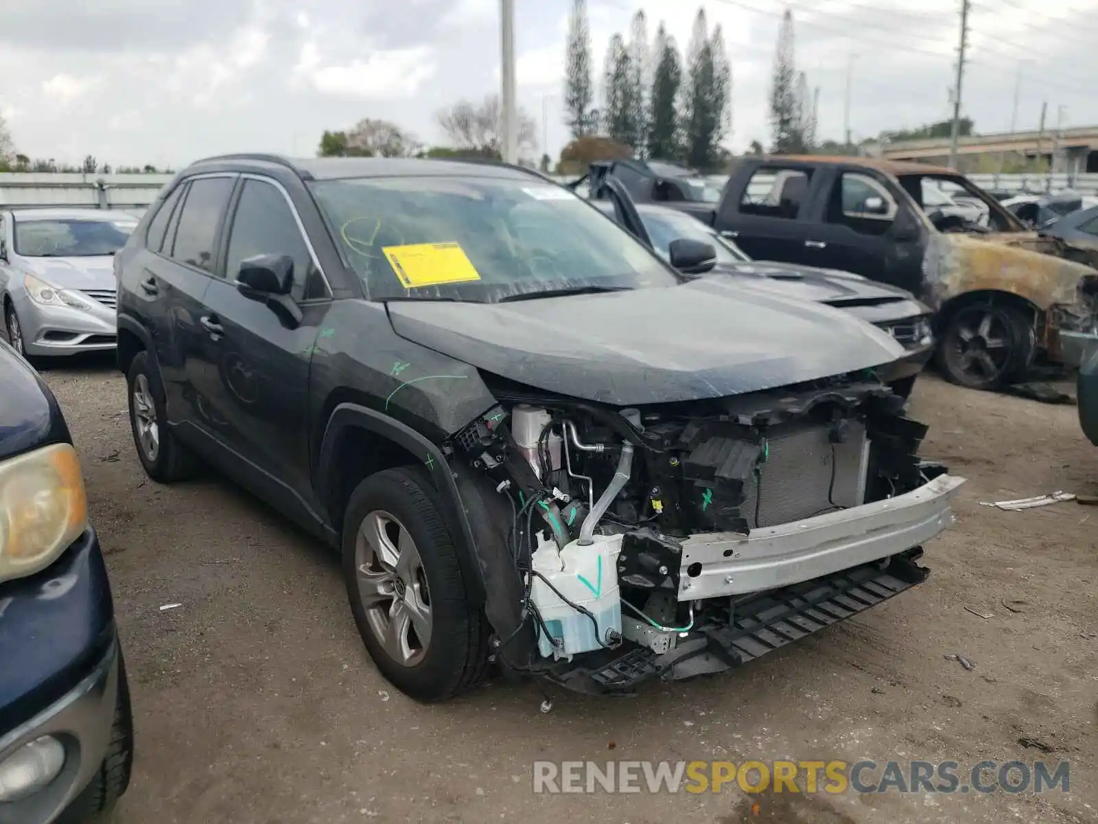 1 Photograph of a damaged car JTMP1RFV1KD042093 TOYOTA RAV4 2019