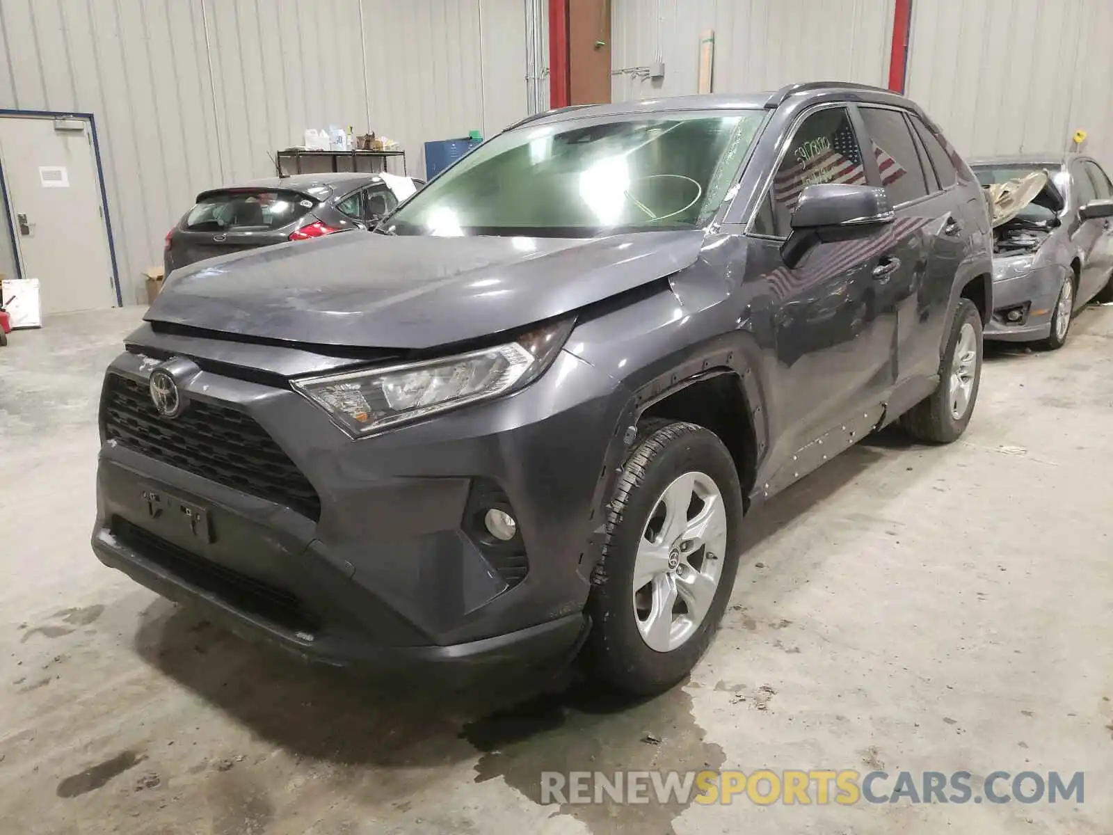 2 Photograph of a damaged car JTMP1RFV1KD524269 TOYOTA RAV4 2019