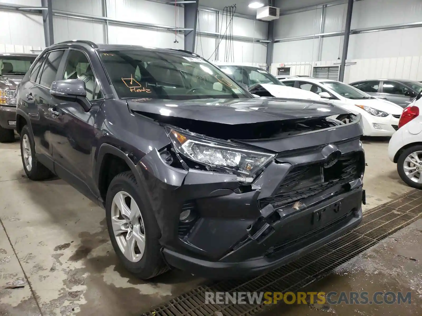 1 Photograph of a damaged car JTMP1RFV1KJ001710 TOYOTA RAV4 2019