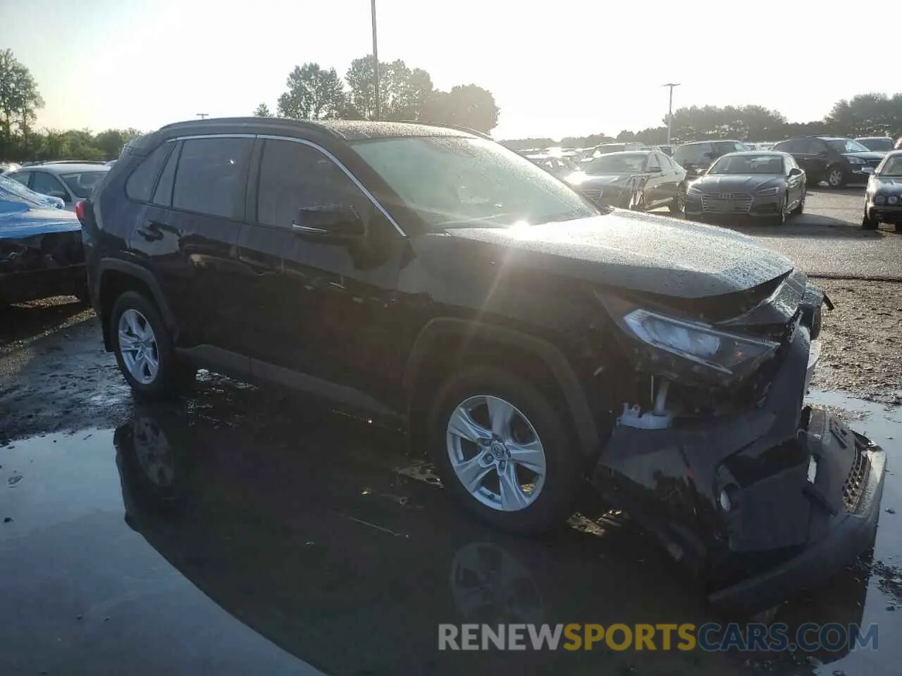 4 Photograph of a damaged car JTMP1RFV2KD037713 TOYOTA RAV4 2019