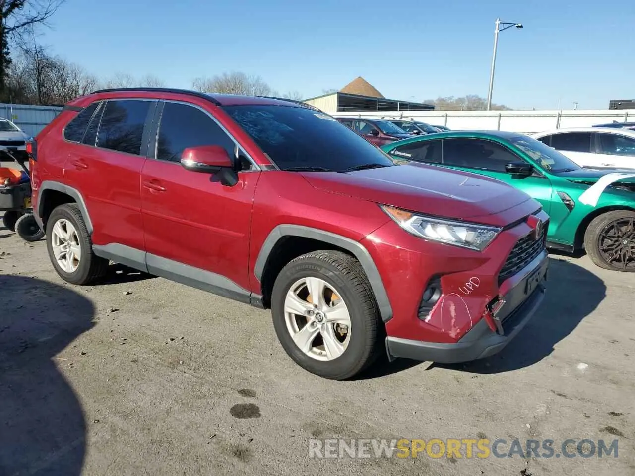 4 Photograph of a damaged car JTMP1RFV2KD039171 TOYOTA RAV4 2019