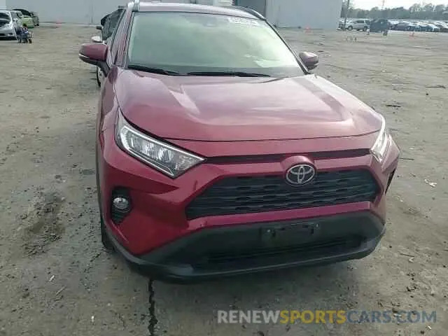 11 Photograph of a damaged car JTMP1RFV3KD034965 TOYOTA RAV4 2019