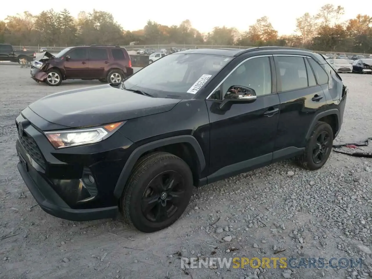 1 Photograph of a damaged car JTMP1RFV3KD501303 TOYOTA RAV4 2019