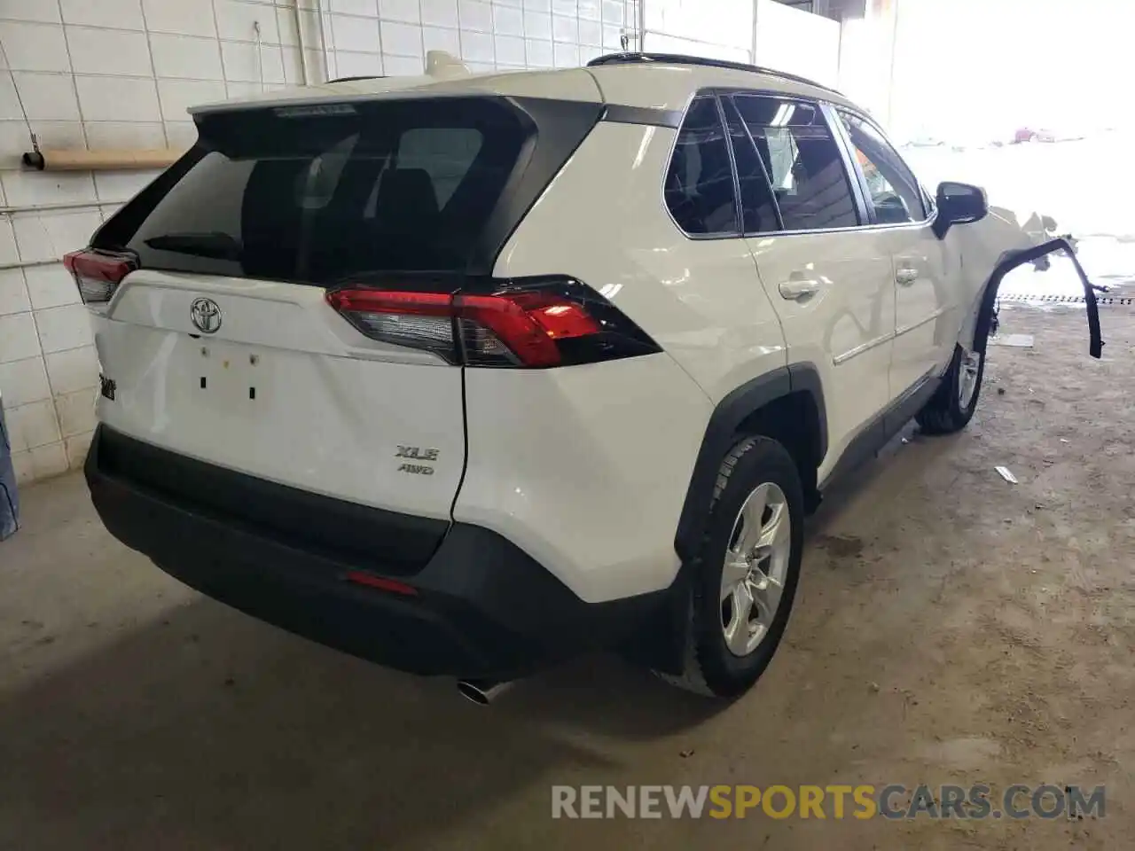 4 Photograph of a damaged car JTMP1RFV3KD502564 TOYOTA RAV4 2019