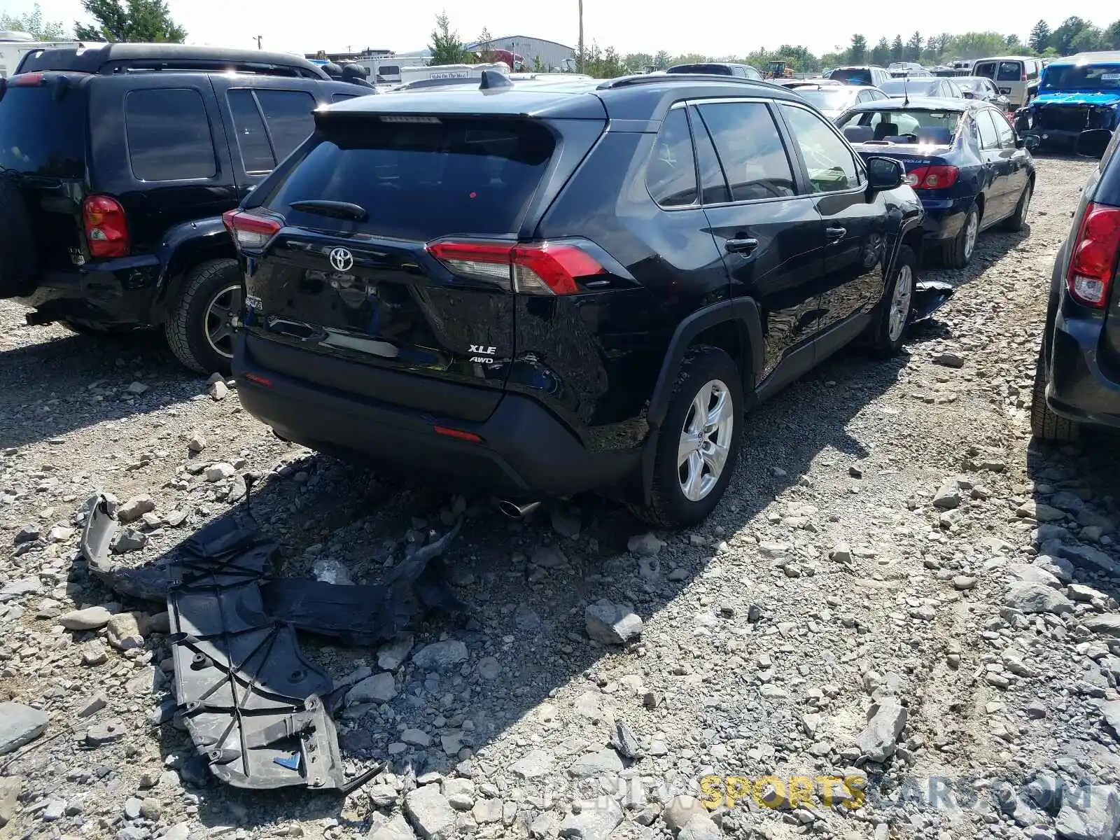 4 Photograph of a damaged car JTMP1RFV4KD515114 TOYOTA RAV4 2019