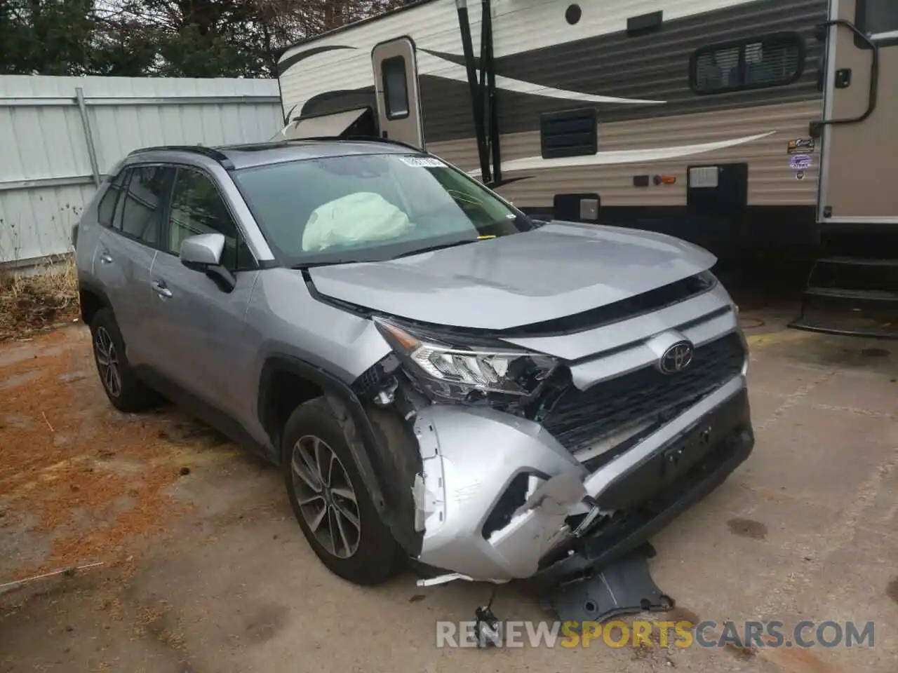 1 Photograph of a damaged car JTMP1RFV4KJ023507 TOYOTA RAV4 2019