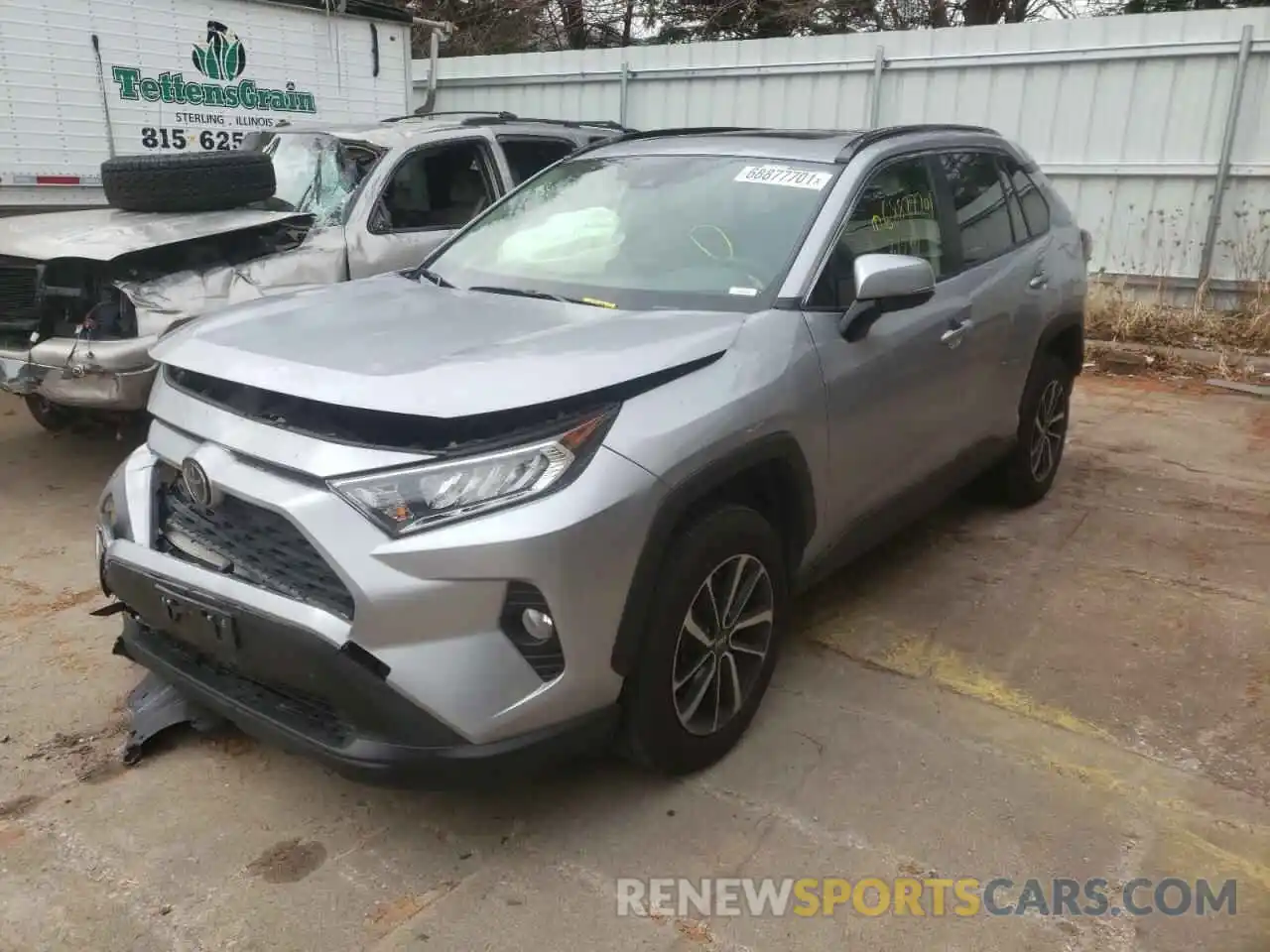 2 Photograph of a damaged car JTMP1RFV4KJ023507 TOYOTA RAV4 2019