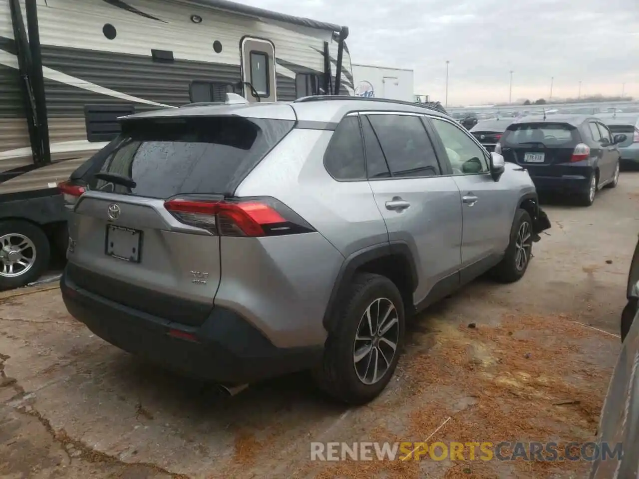 4 Photograph of a damaged car JTMP1RFV4KJ023507 TOYOTA RAV4 2019