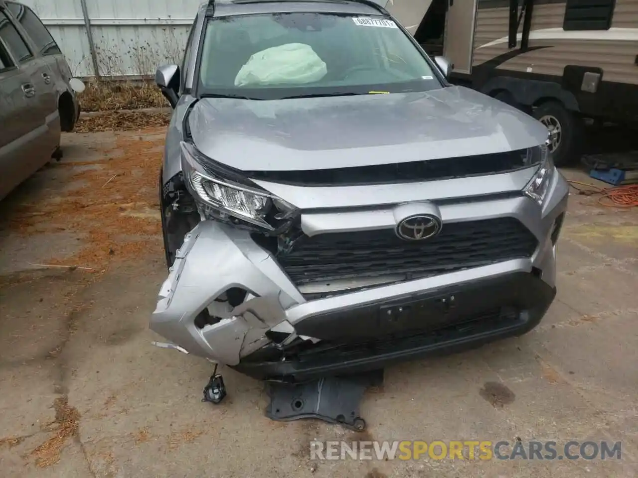 9 Photograph of a damaged car JTMP1RFV4KJ023507 TOYOTA RAV4 2019