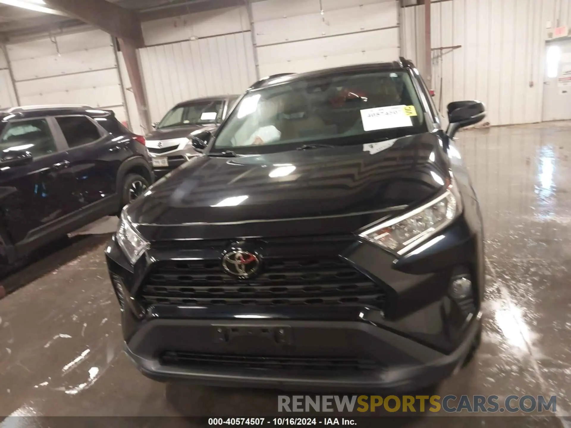 12 Photograph of a damaged car JTMP1RFV5KD028777 TOYOTA RAV4 2019