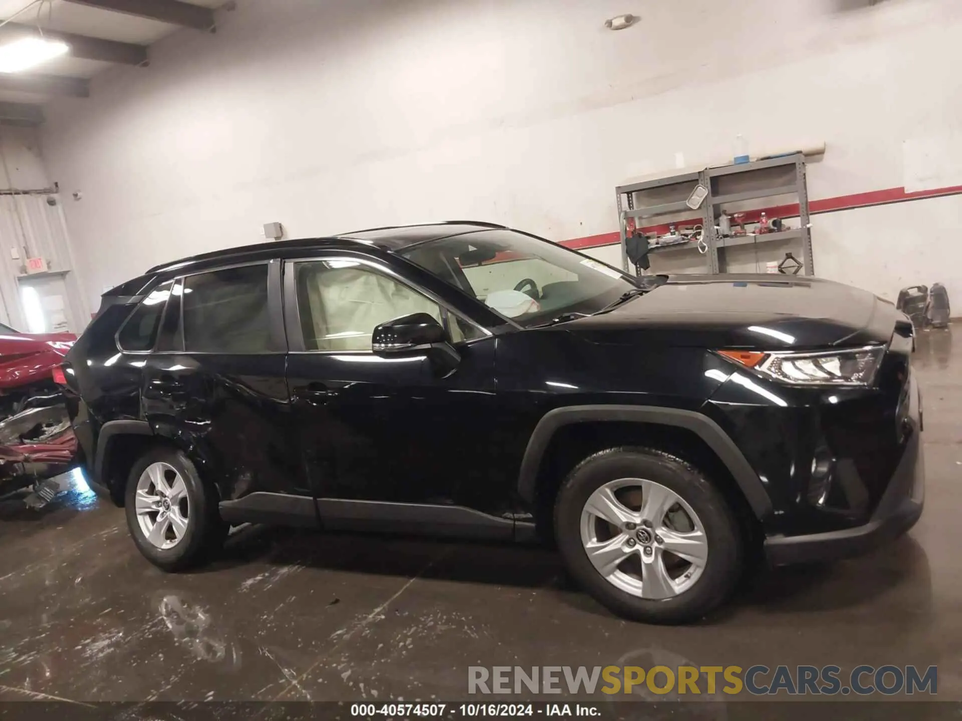 13 Photograph of a damaged car JTMP1RFV5KD028777 TOYOTA RAV4 2019
