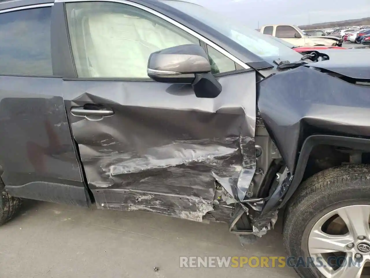 9 Photograph of a damaged car JTMP1RFV6KD003161 TOYOTA RAV4 2019