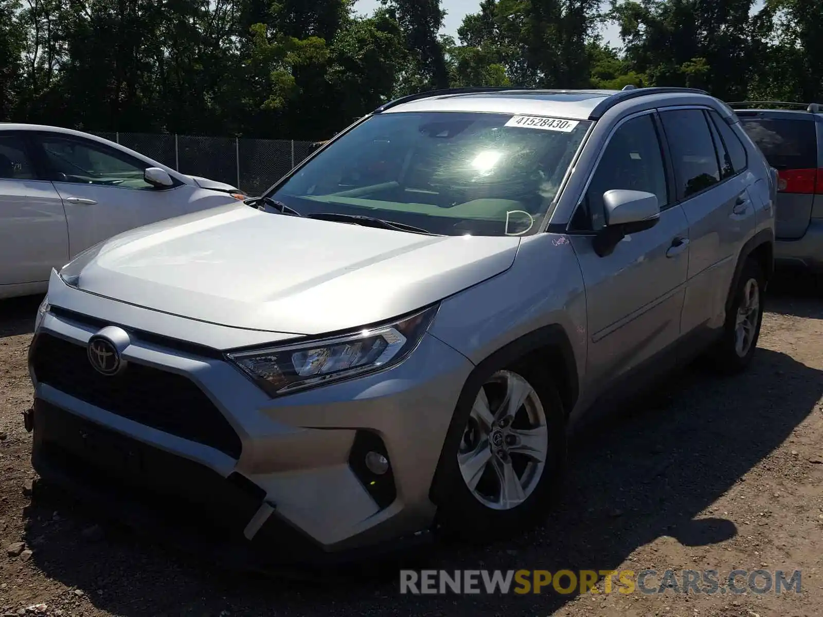 2 Photograph of a damaged car JTMP1RFV6KD516619 TOYOTA RAV4 2019