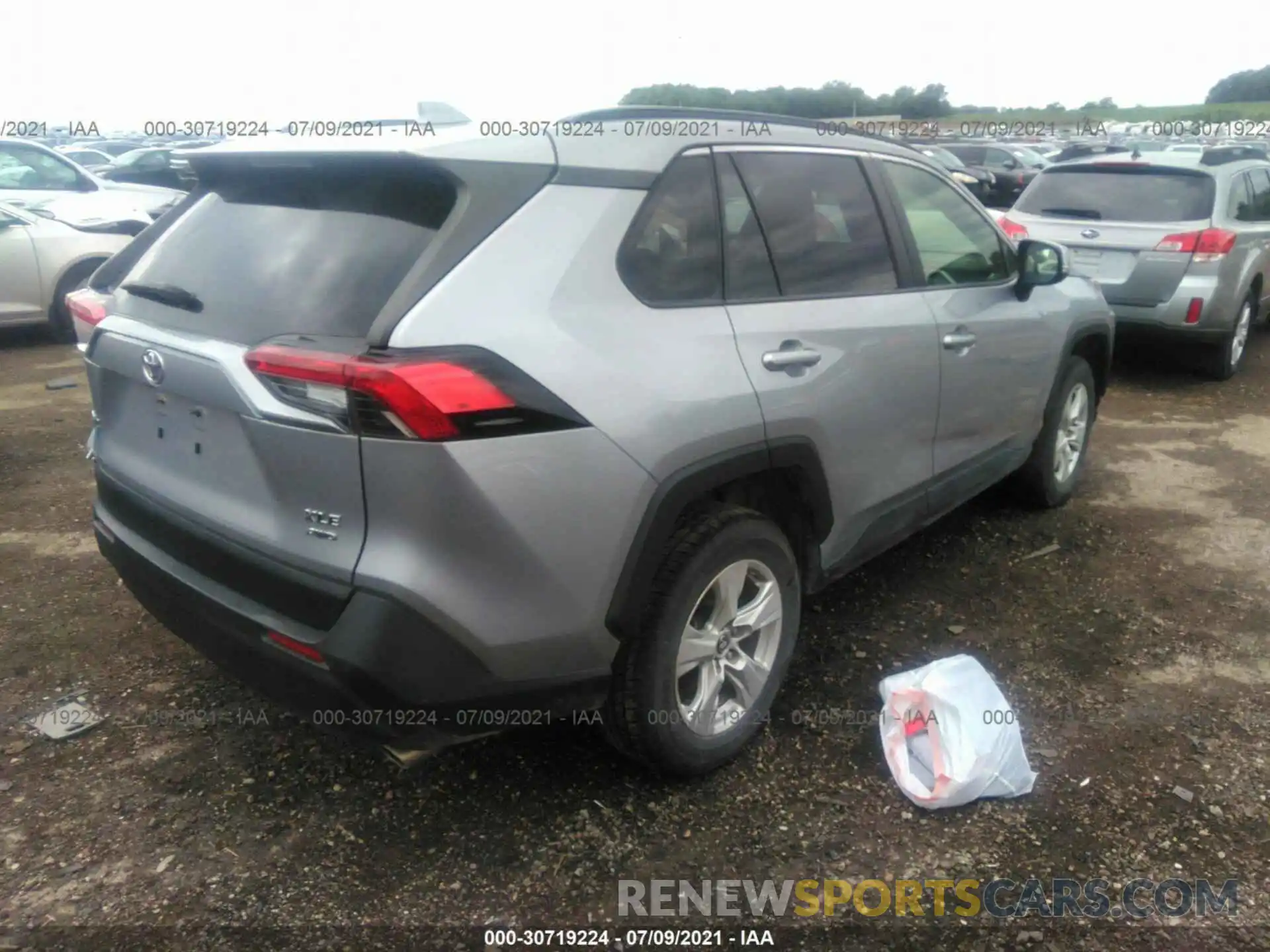 4 Photograph of a damaged car JTMP1RFV7KD007560 TOYOTA RAV4 2019