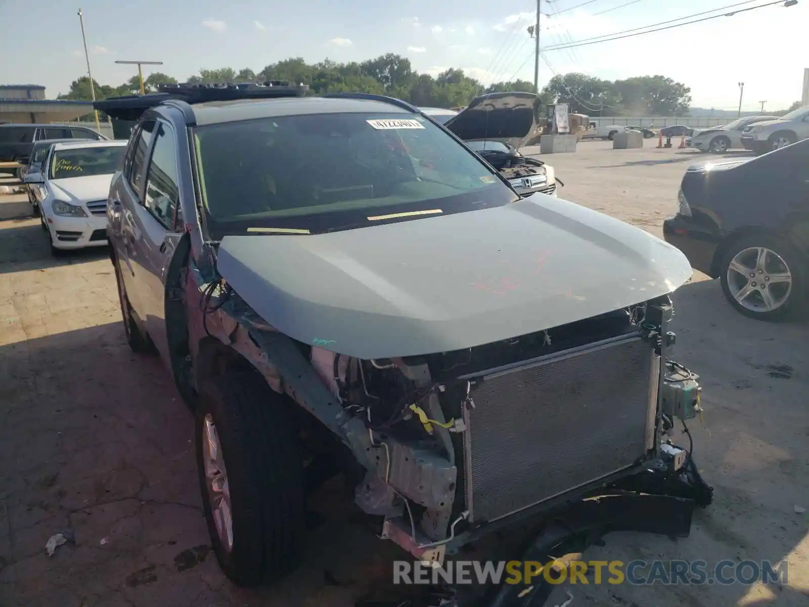 1 Photograph of a damaged car JTMP1RFV7KD025878 TOYOTA RAV4 2019