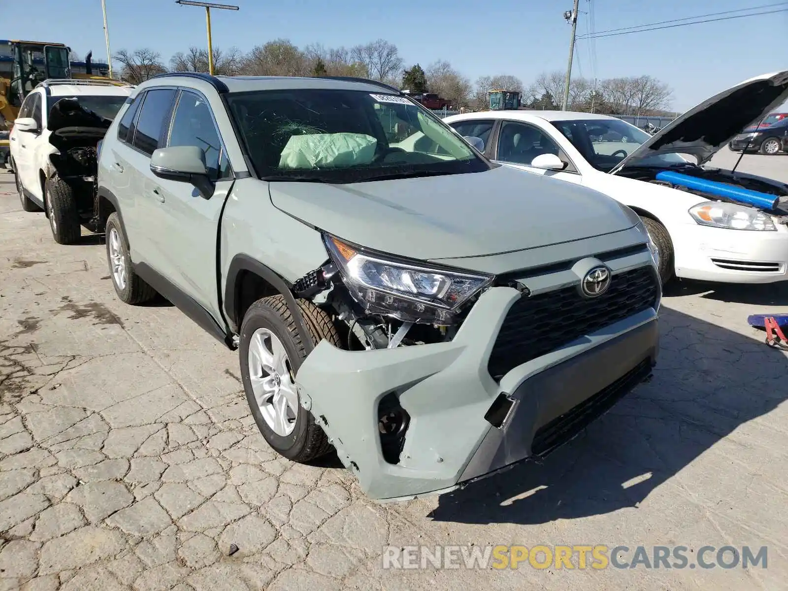 1 Photograph of a damaged car JTMP1RFV7KJ021248 TOYOTA RAV4 2019