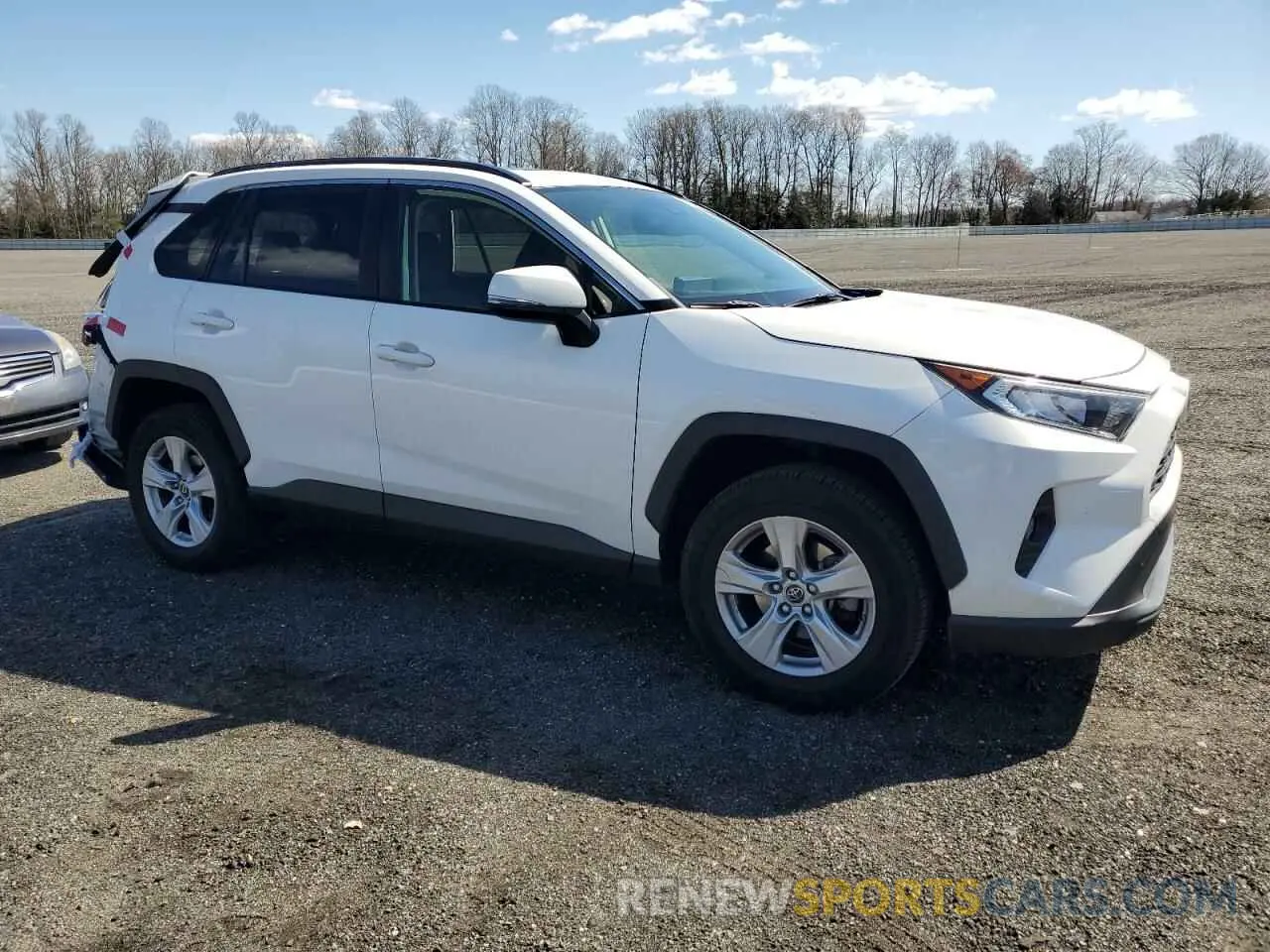 4 Photograph of a damaged car JTMP1RFV8KD009012 TOYOTA RAV4 2019