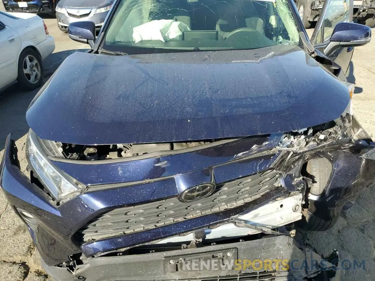 12 Photograph of a damaged car JTMP1RFV8KD513544 TOYOTA RAV4 2019