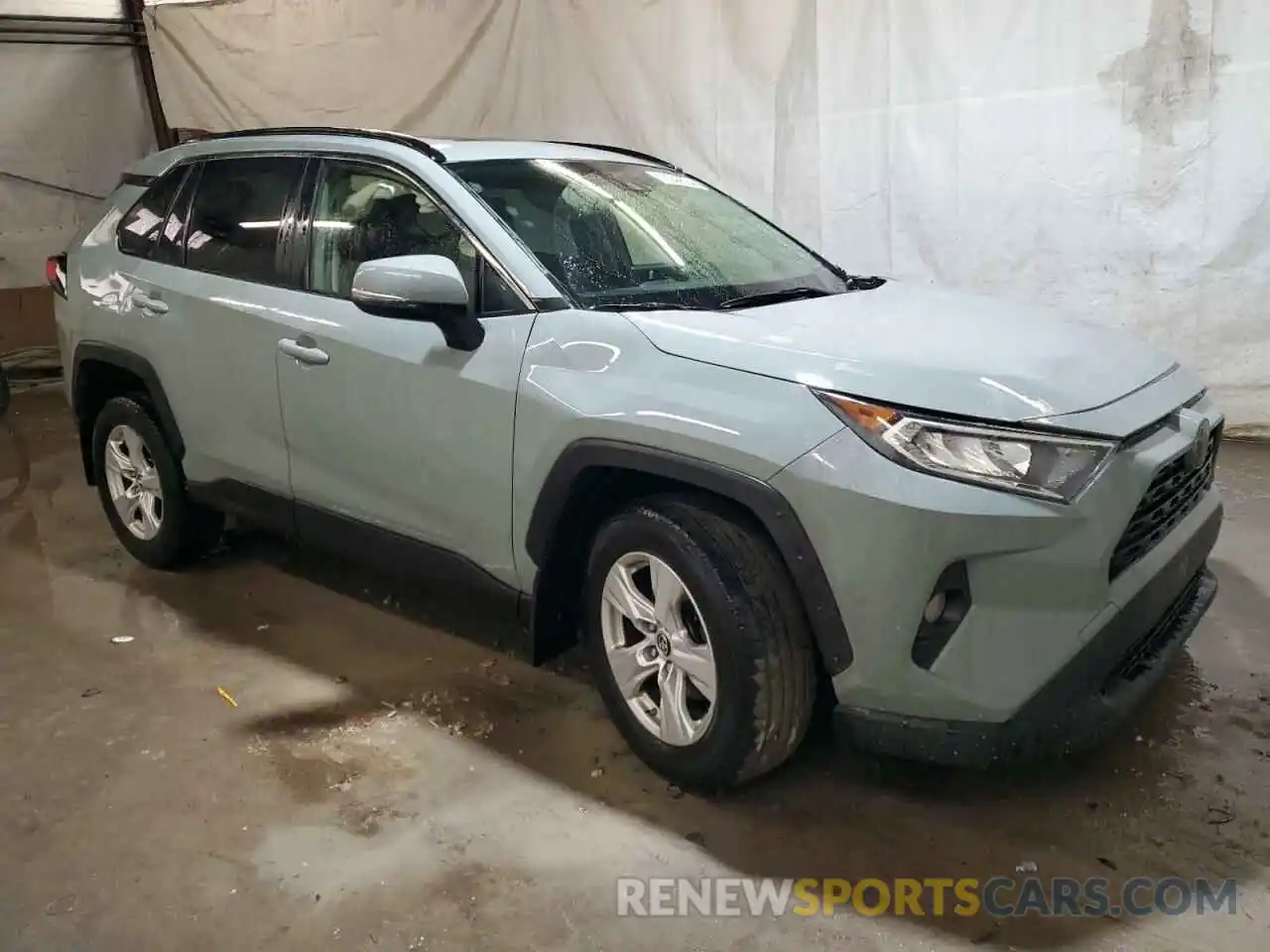 4 Photograph of a damaged car JTMP1RFV9KD032296 TOYOTA RAV4 2019