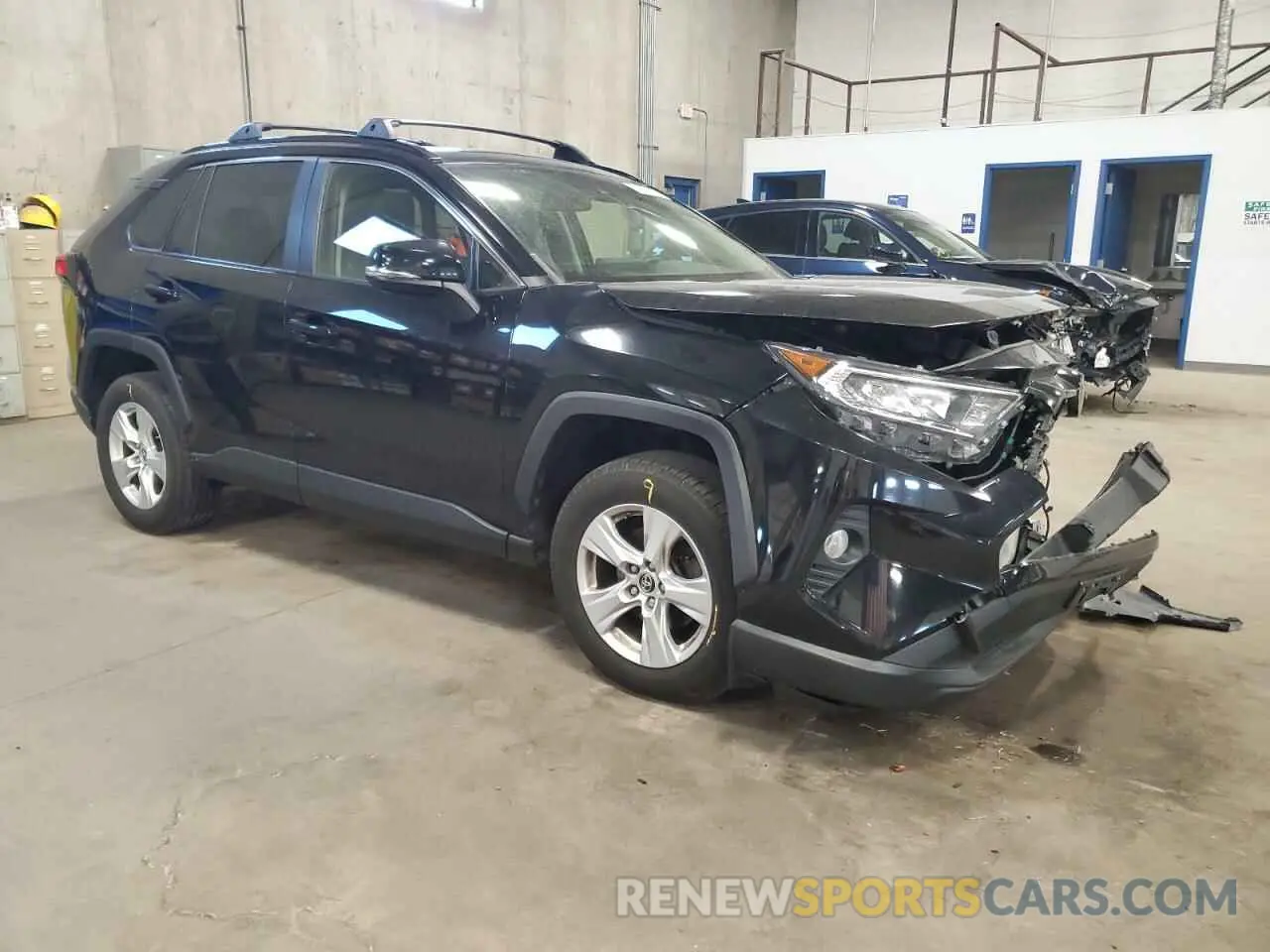 4 Photograph of a damaged car JTMP1RFV9KD507333 TOYOTA RAV4 2019