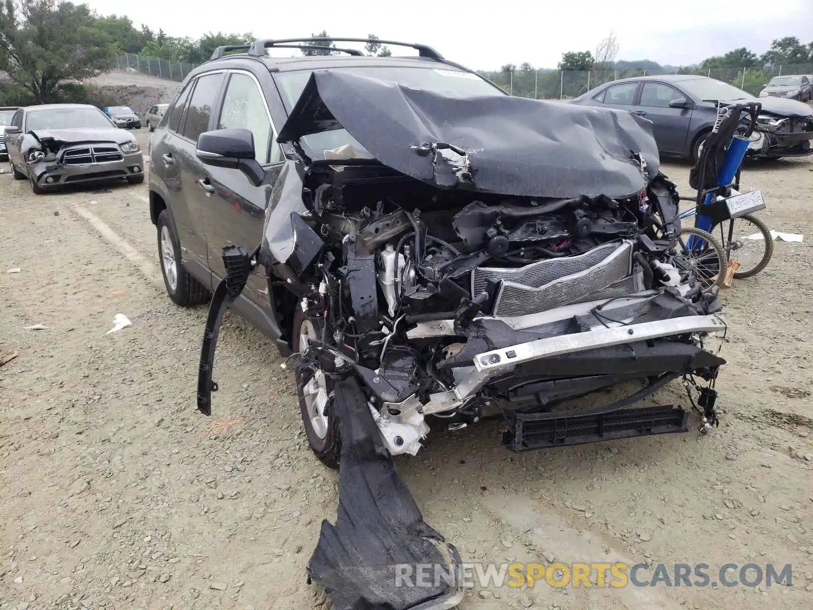 1 Photograph of a damaged car JTMRWRFV0KD511054 TOYOTA RAV4 2019