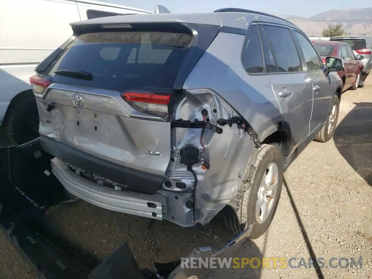 4 Photograph of a damaged car JTMW1RFV0KD012899 TOYOTA RAV4 2019