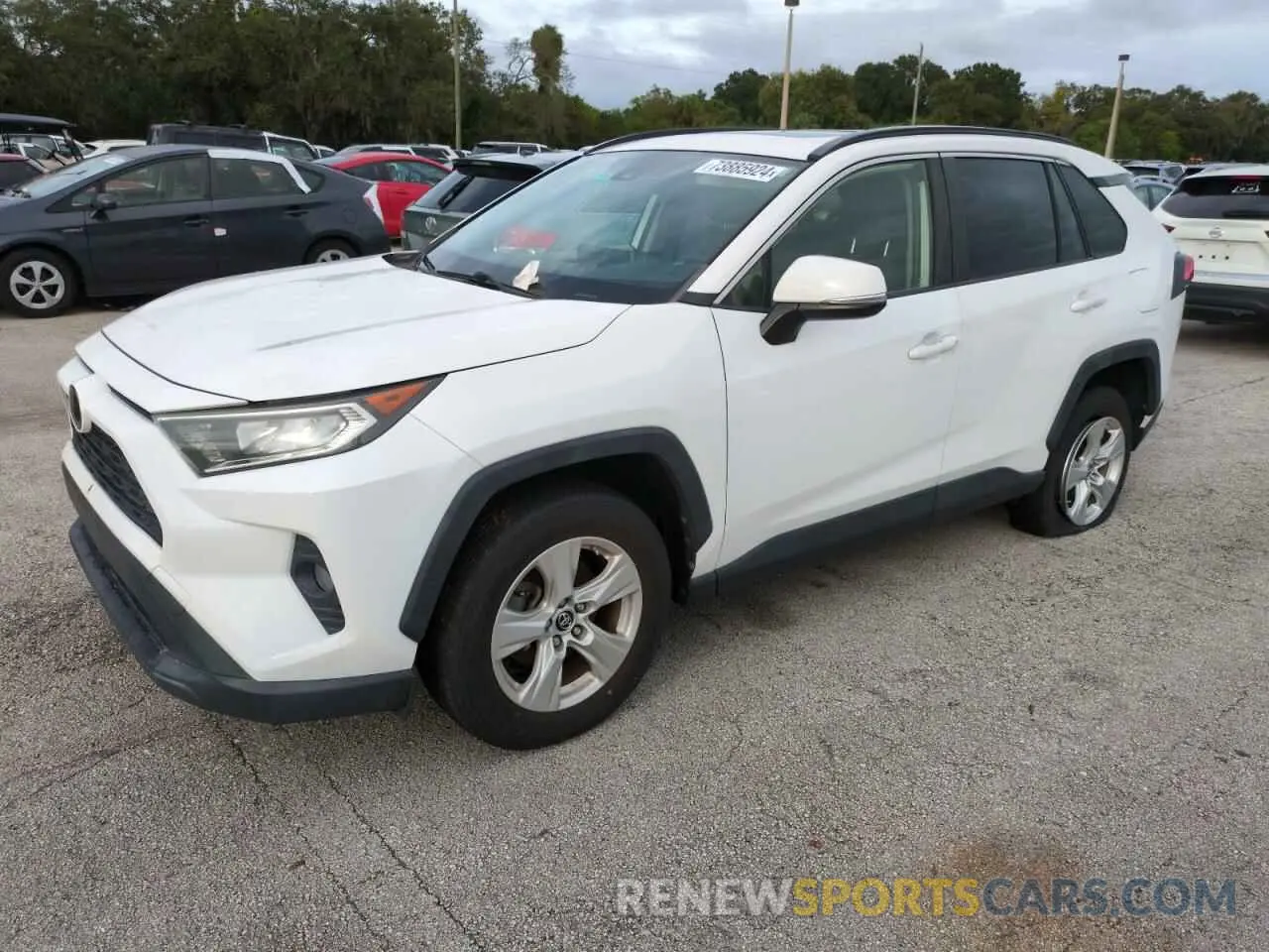 1 Photograph of a damaged car JTMW1RFV0KD017651 TOYOTA RAV4 2019