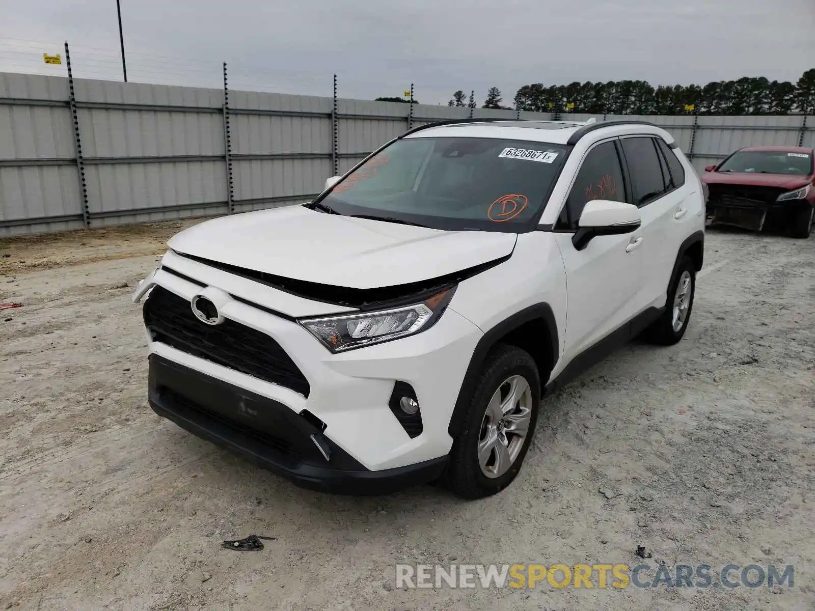 2 Photograph of a damaged car JTMW1RFV0KD019108 TOYOTA RAV4 2019