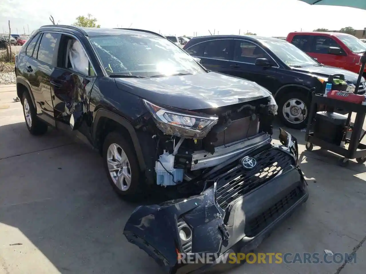 1 Photograph of a damaged car JTMW1RFV3KJ011859 TOYOTA RAV4 2019