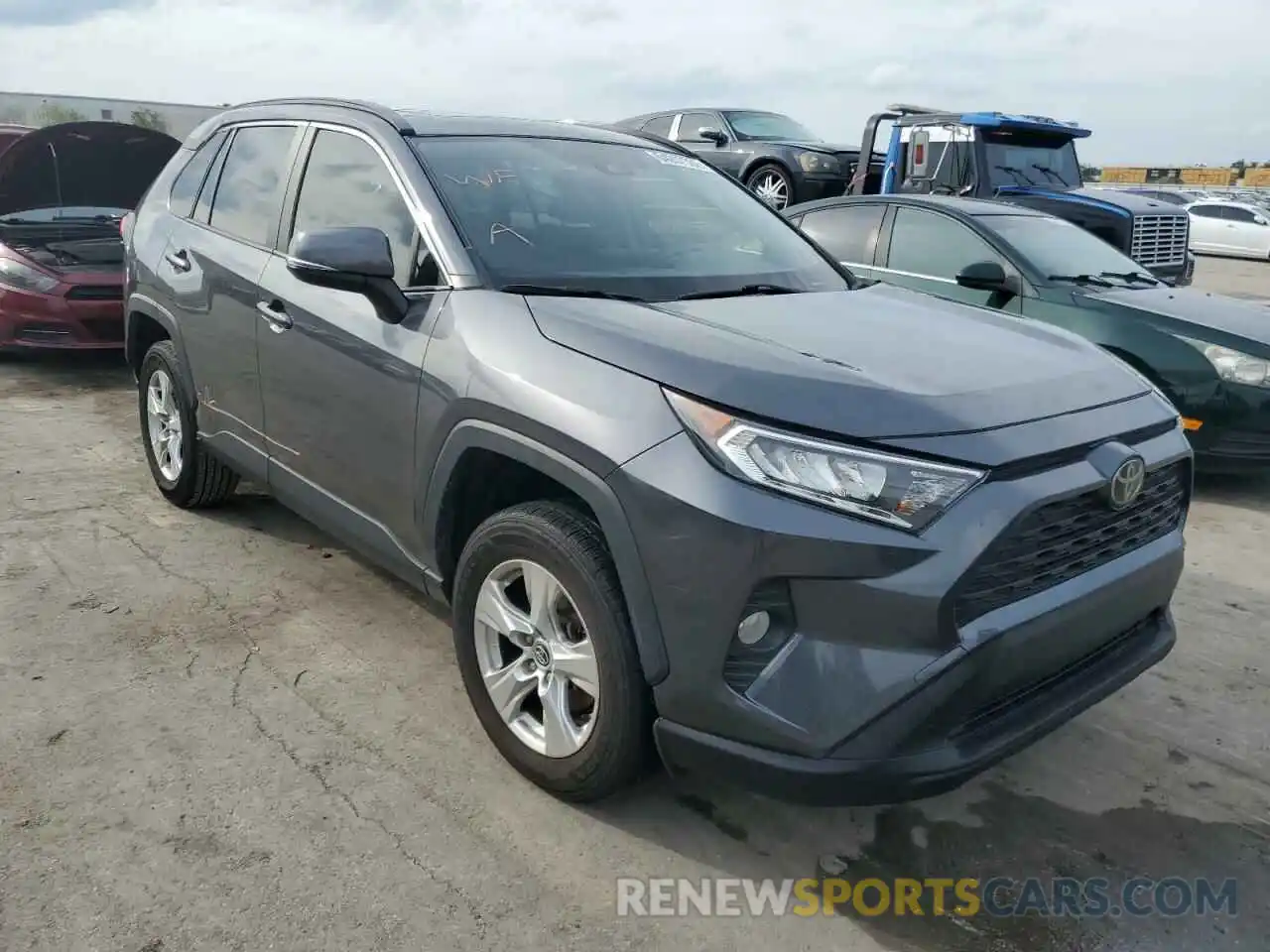 1 Photograph of a damaged car JTMW1RFV7KD009580 TOYOTA RAV4 2019