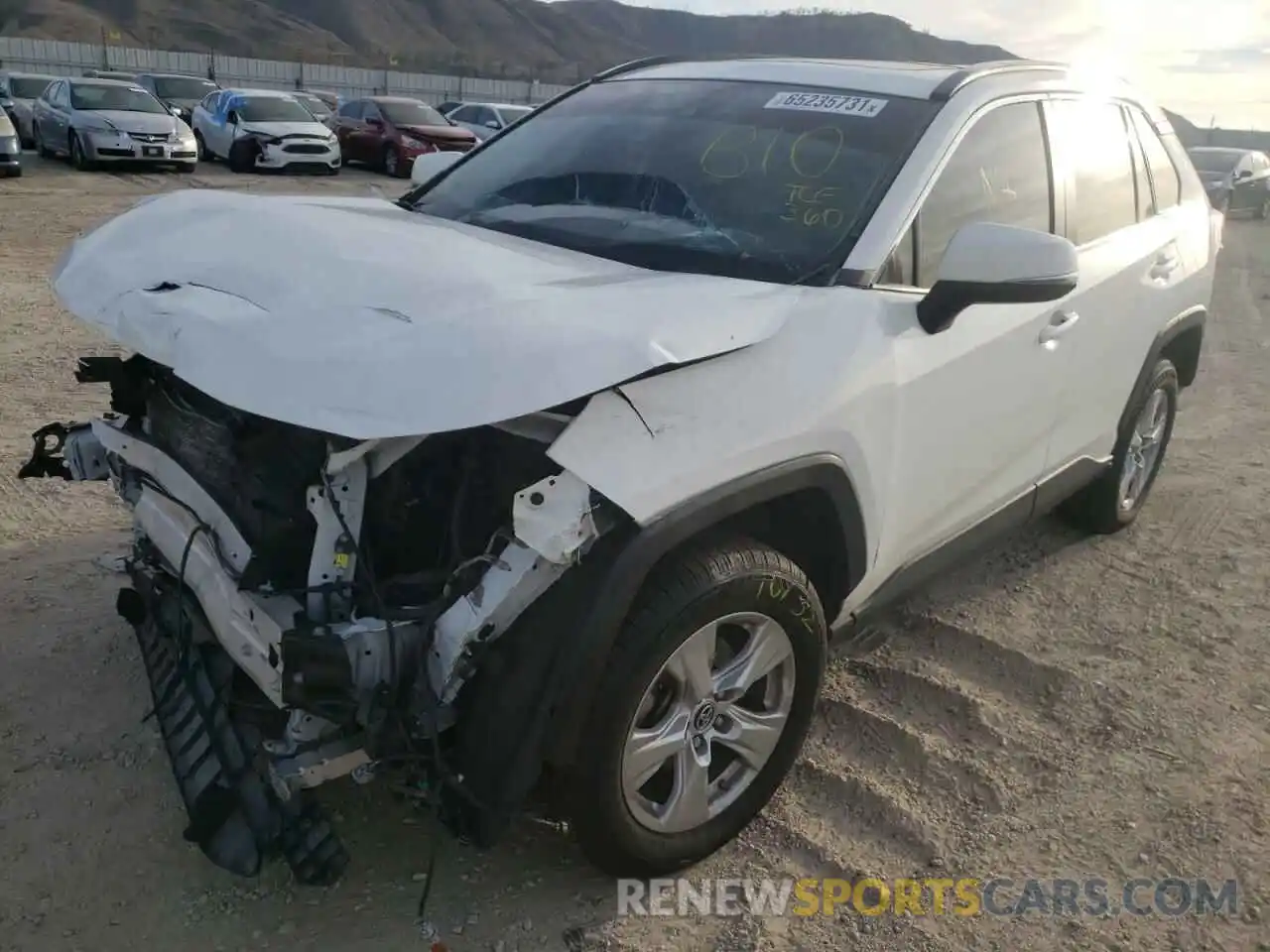 2 Photograph of a damaged car JTMW1RFV9KD011167 TOYOTA RAV4 2019